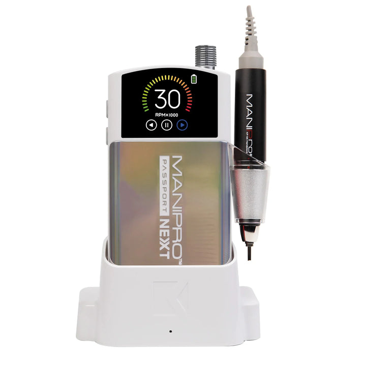 KUPA MANIPro Passport NEXT nail drill in Unicorn holographic finish, front view in white charging dock with handpiece