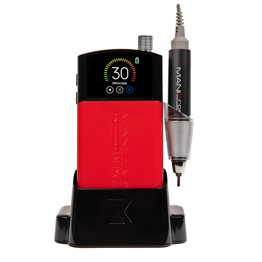 KUPA MANIPro Passport NEXT nail drill in Black with red jacket, front view in black charging dock with handpiece